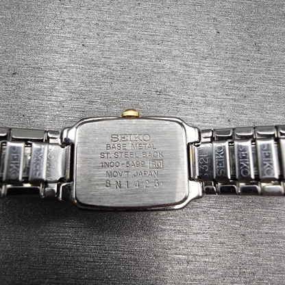 Seiko Watch Women 15mm Silver Dial Silver Tone Rectangle 1N00-5A99 New Battery10