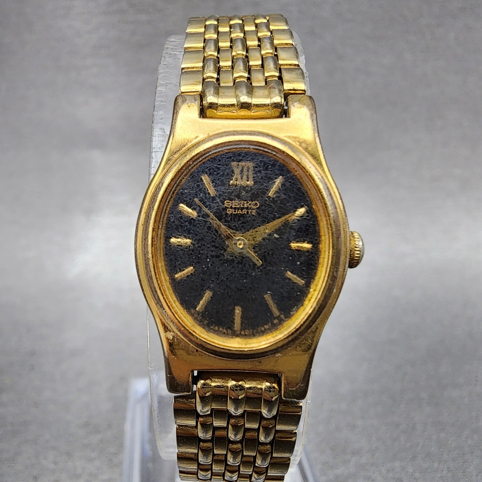 Seiko Watch Women 18mm Black Dial Gold Tone Oval V4015109 New Battery ABC1230