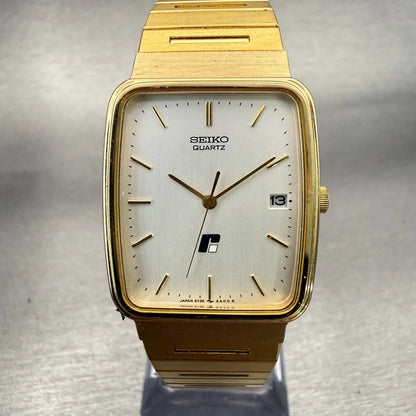 Seiko Watch Men 26mm White Dial Gold Tone Date Rectangle 5Y32-5A09 New Battery0