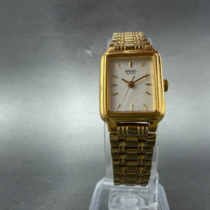Seiko Tank Watch Women 18mm White Dial Gold Tone Rectangle V401-5129 New Batt NH5