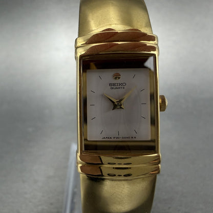 Seiko Watch Women 15mm White Dial Gold Tone Rectangle 1F20-5K19 New Battery YYTF1