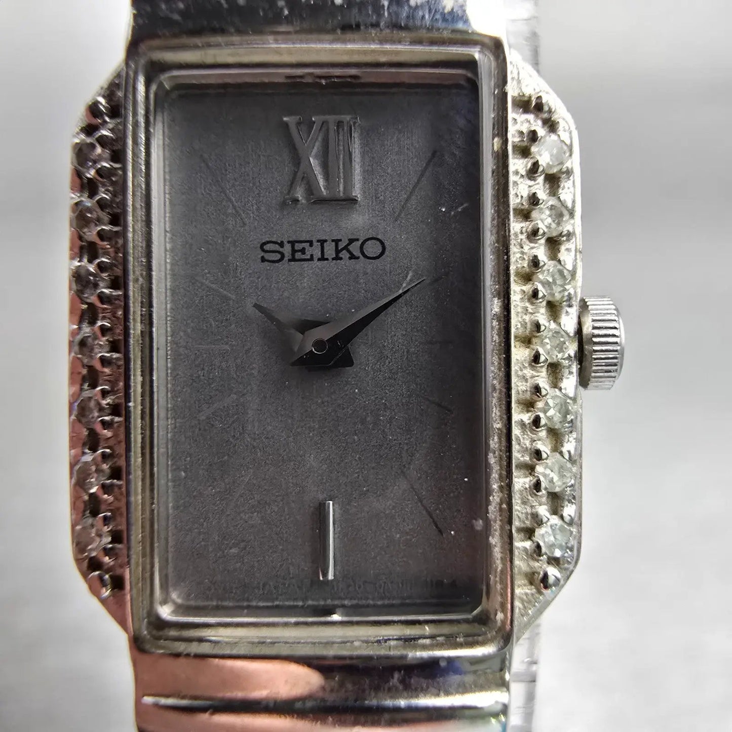 Seiko Watch Women 16mm Silver Dial Silver Tone Gemmed 1F20-0AB0 New Battery VTG1