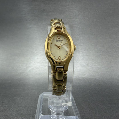 Seiko Watch Women 17mm Champagne Dial Gold Tone Oval 1N01-0CS0 New Battery5