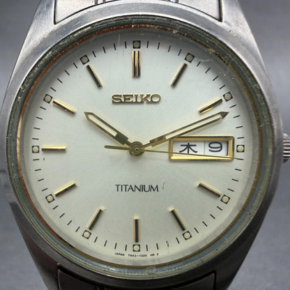 Seiko Watch Men 36mm Champagne Dial Two Tone Titanium Daydate 7N43-9100 New Bat31