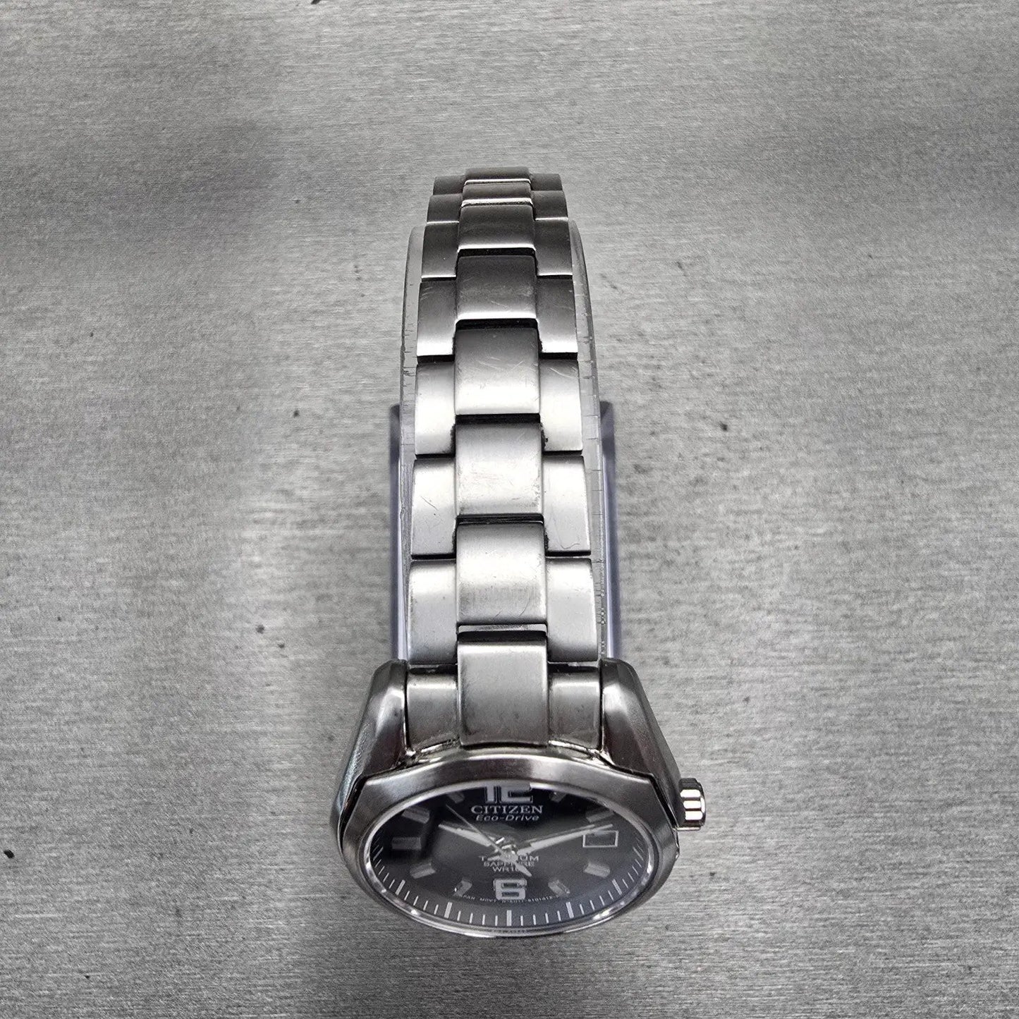 Citizen Eco-Drive Watch Women 27mm Black Dial Titanium Date E011-S068479 Works4