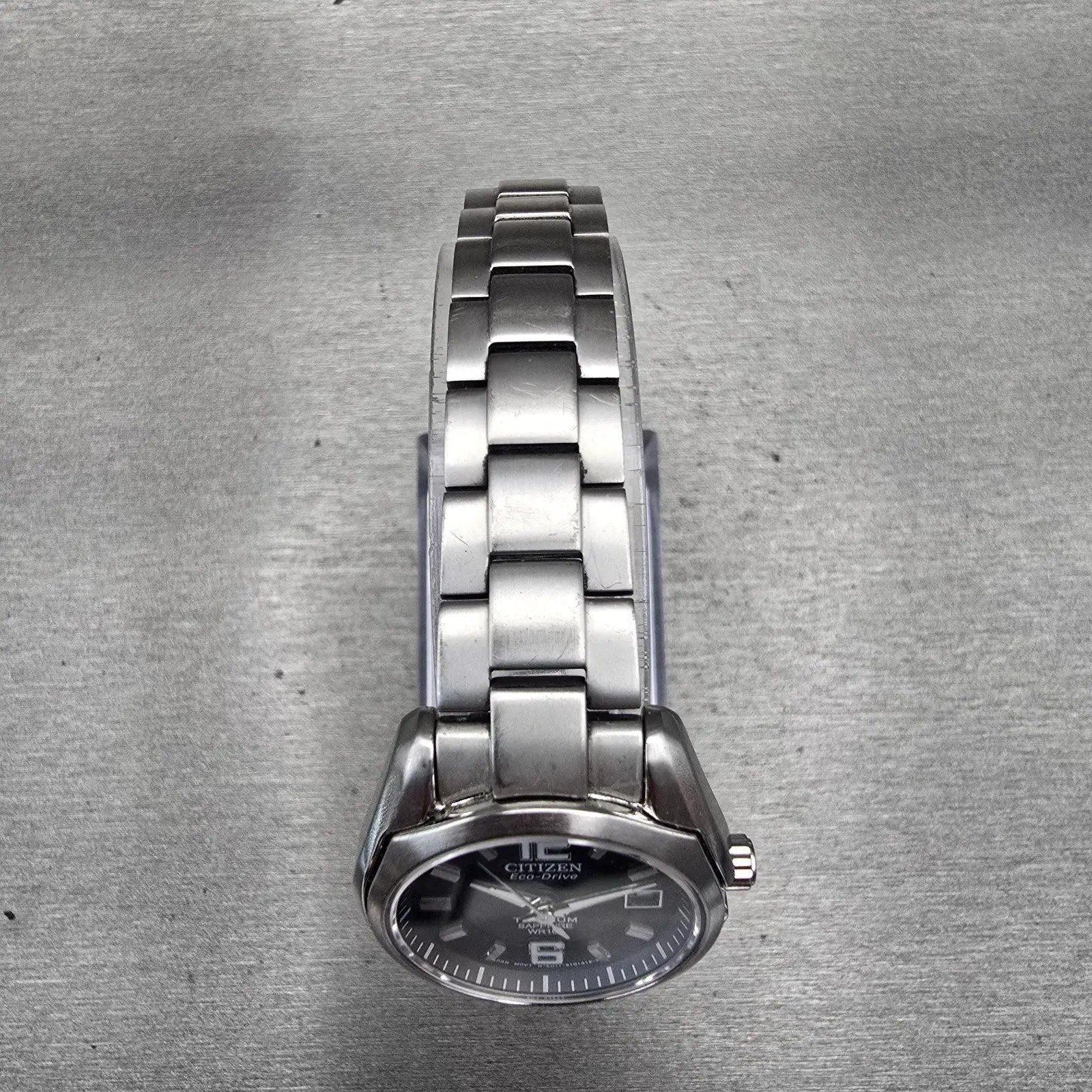 Citizen Eco-Drive Watch Women 27mm Black Dial Titanium Date E011-S068479 Works4