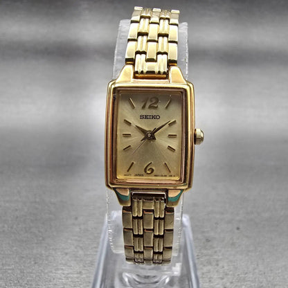 Seiko Watch Women 16mm Champagne Dial Gold Tone Rectangle 1N01-0FH0 New Battery0