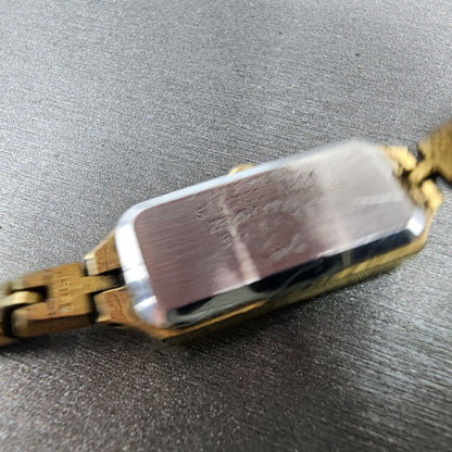 Seiko Watch Women 12mm Champagne Dial Gold Tone Rectangle 2E205179 New Battery9