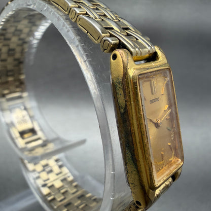 Seiko Tank Watch Women 13mm Champagne Dial Gold Tone 2e20-7021 New Battery 45672