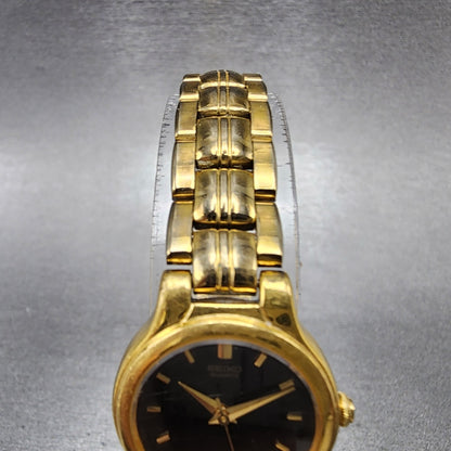 Seiko Watch Women 21mm Black Dial Gold Tone Round V4011111 New Battery4