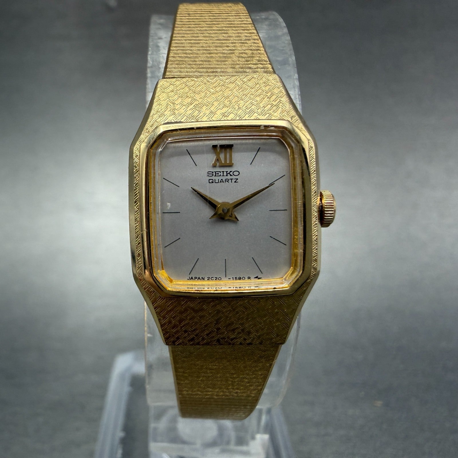 Seiko Watch Women 17mm Silver Dial Gold Tone Rectangle 2C20-5780 New Battery0