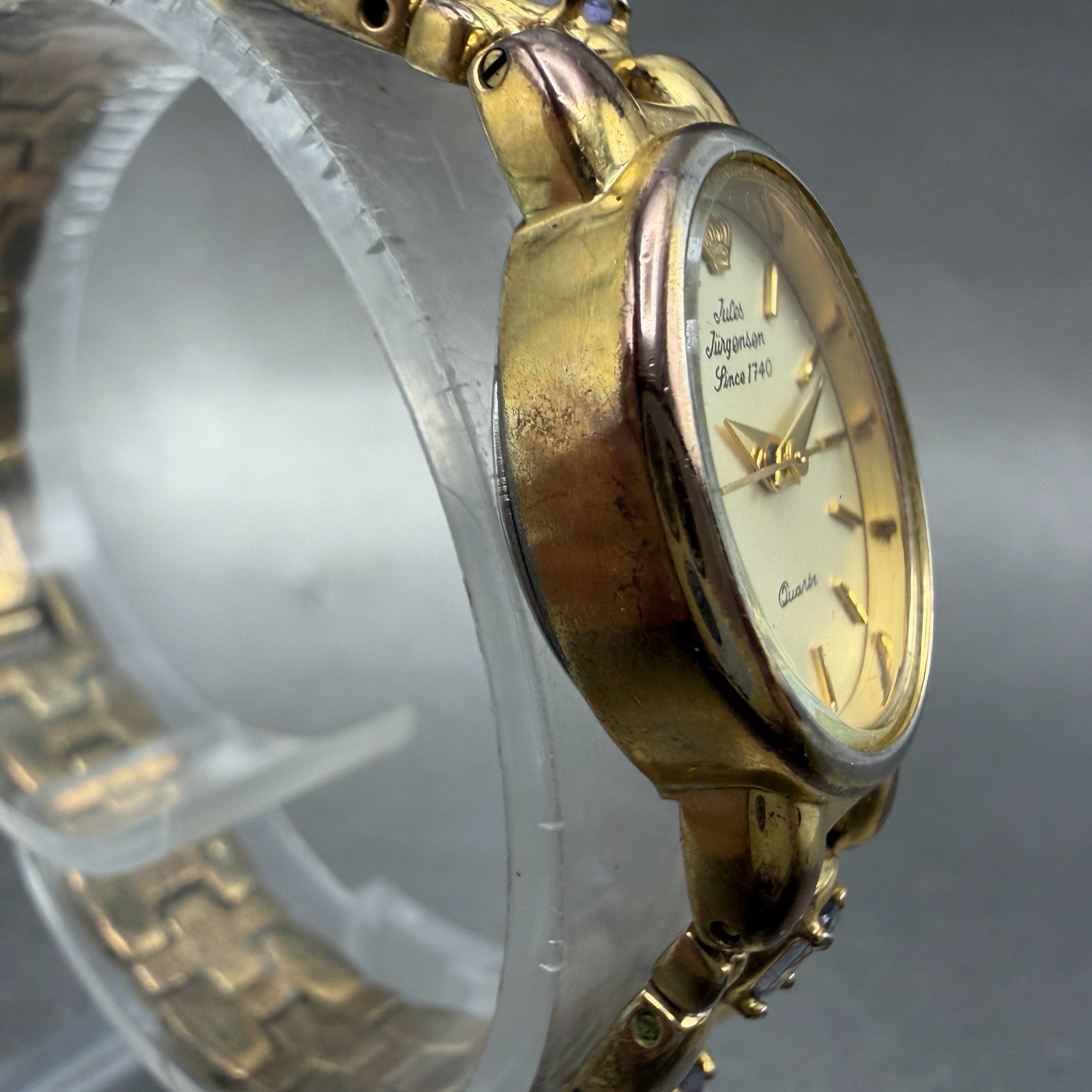 Jules Jurgenson Watch Women 17mm Champagne Dial Gold Oval Blue Gems New Battery3