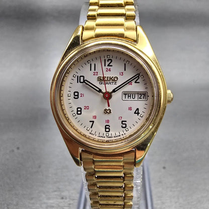 Seiko SQ Watch Women 24mm White Dial Gold Tone Daydate Round 7N83-6A09 New Batt0