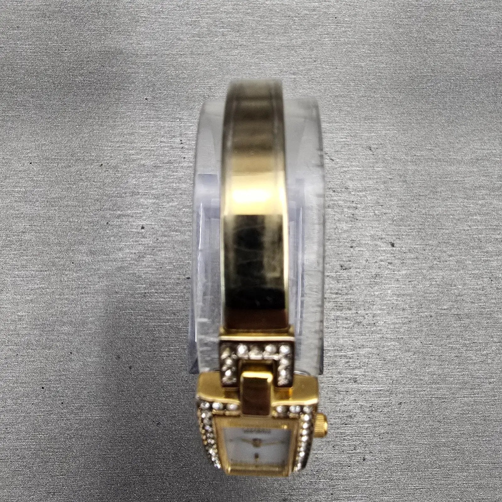Citizen Eco-Drive Tank Watch Women 14mm White Dial Gold Tone Gemmed Bangle Works4