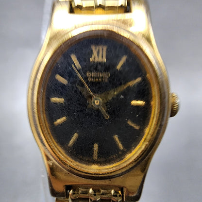 Seiko Watch Women 18mm Black Dial Gold Tone Oval V4015109 New Battery ABC1231
