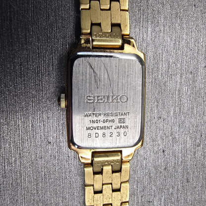 Seiko Watch Women 16mm Champagne Dial Gold Tone Rectangle 1N01-0FH0 New Battery10