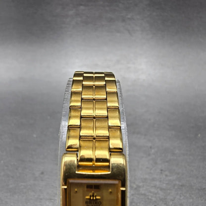 Seiko Tank Watch Women 13mm Champagne Dial Gold Tone 2E20-6590 New Battery VTG J4