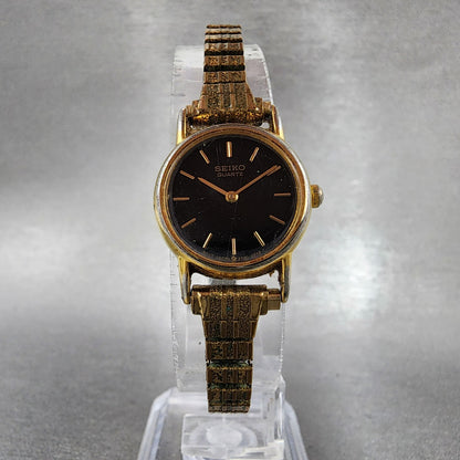 Seiko Watch Women 20mm Black Dial Gold Tone Round 2y00-0A19 New Battery Vintage