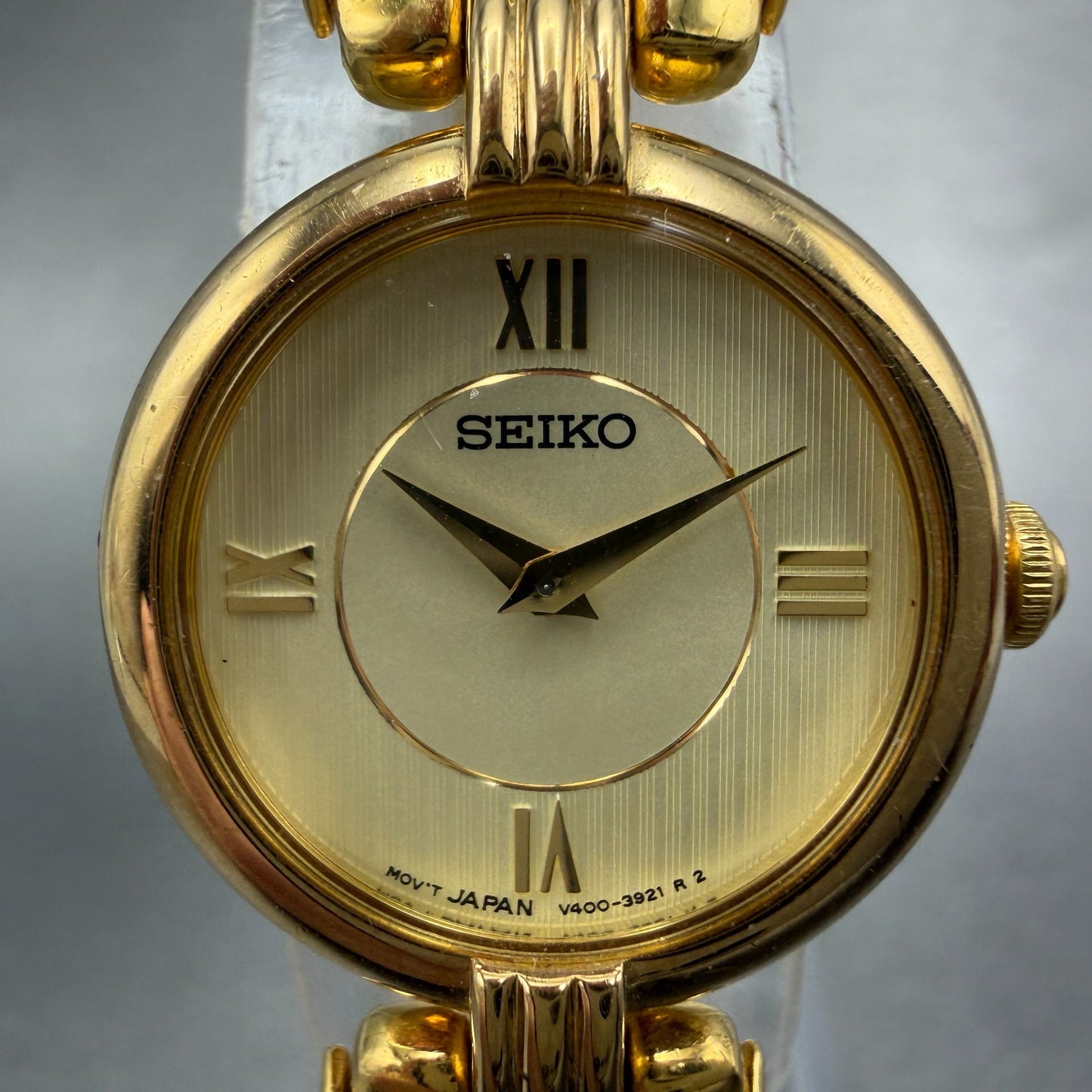 Seiko Watch Women 21mm Champagne Dial Gold Tone Round V400-1400 New Battery1