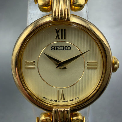 Seiko Watch Women 21mm Champagne Dial Gold Tone Round V400-1400 New Battery1