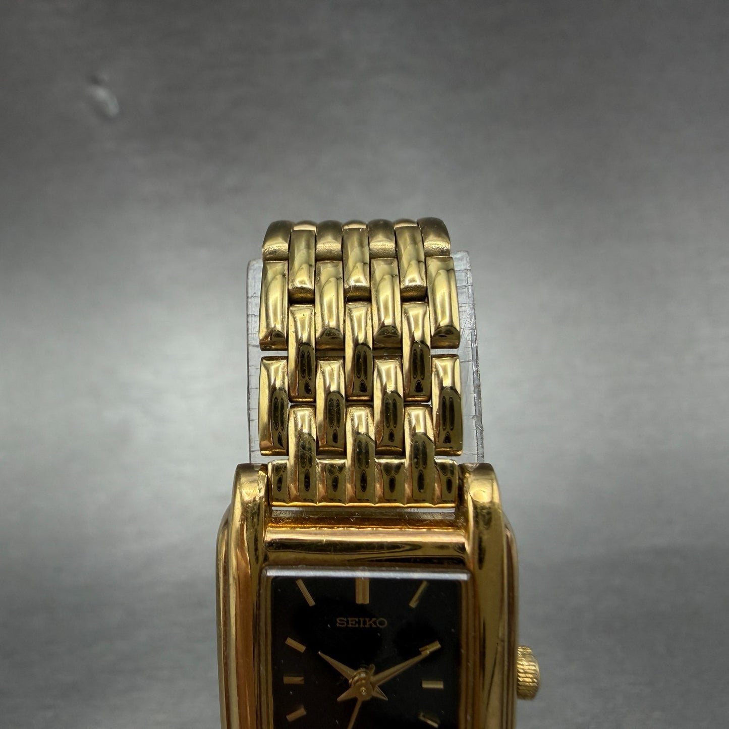 Seiko Tank Watch Women 18mm Black Dial Gold Tone Rectangle V401-5650 New Batt JO4