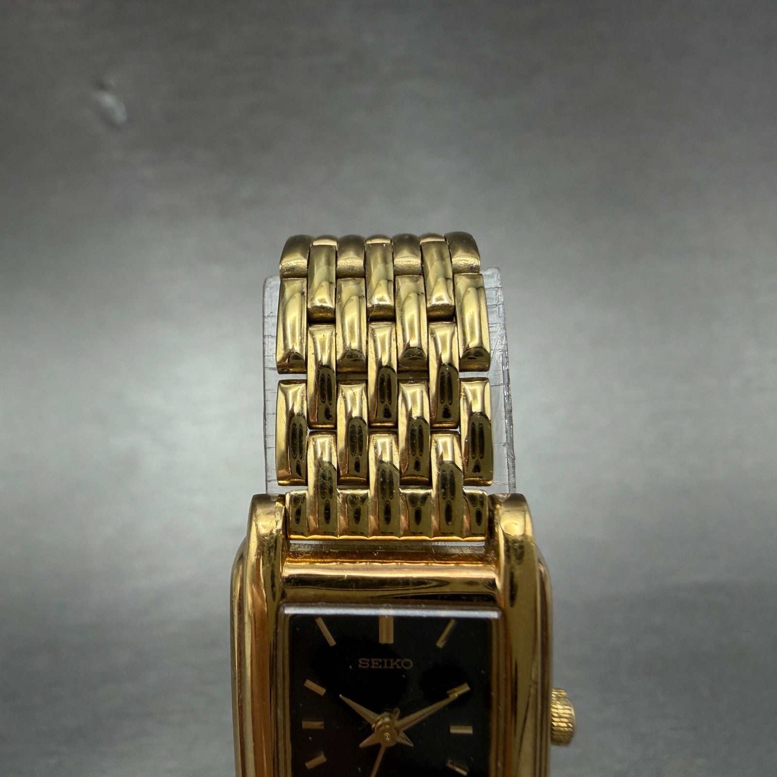 Seiko Tank Watch Women 18mm Black Dial Gold Tone Rectangle V401-5650 New Batt JO4