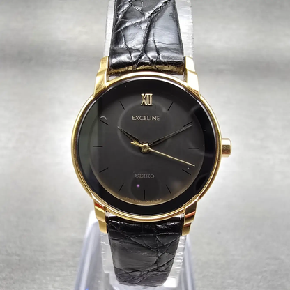 Seiko Exceline Watch Women 22mm Black Dial Gold Tone Round 7321-0770 New Battery0