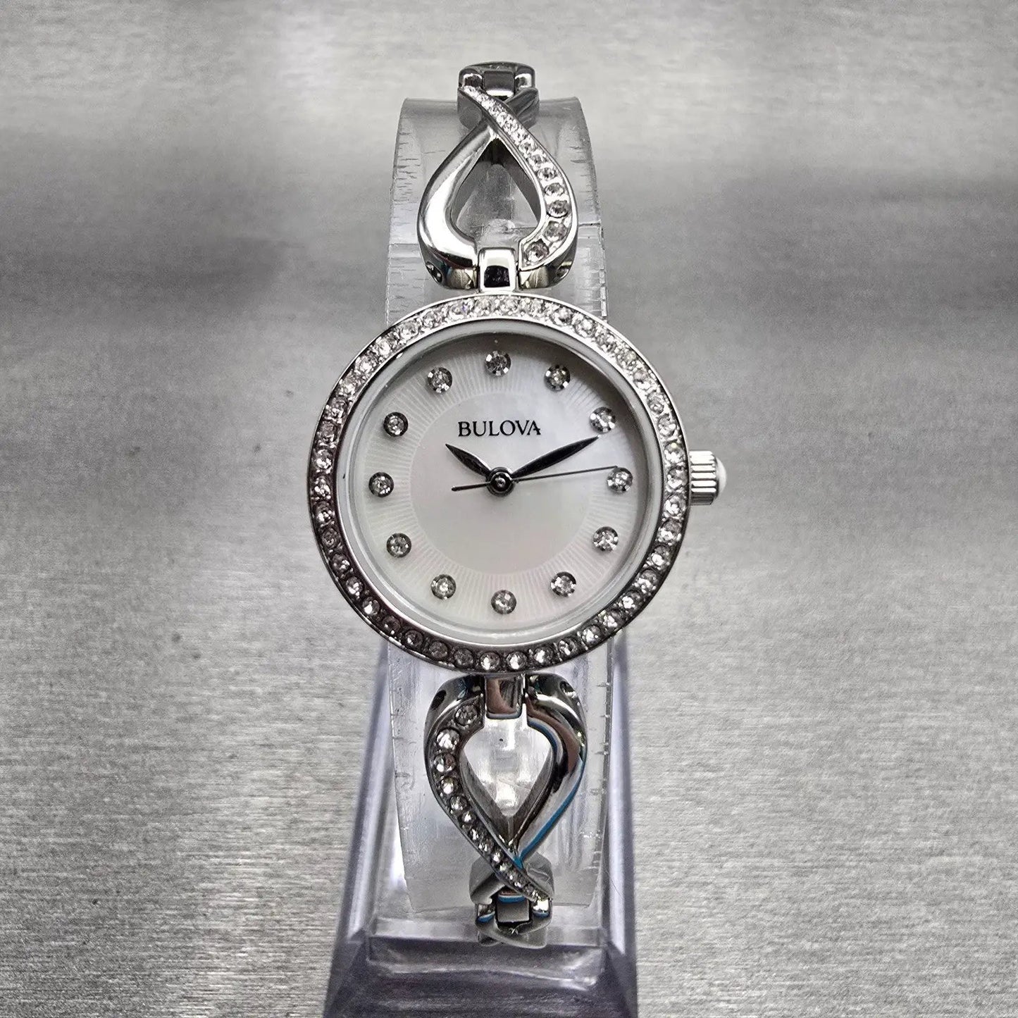 Bulova Watch Women 23mm MOP Dial Silver Tone Gemmed 96X129 New Battery0