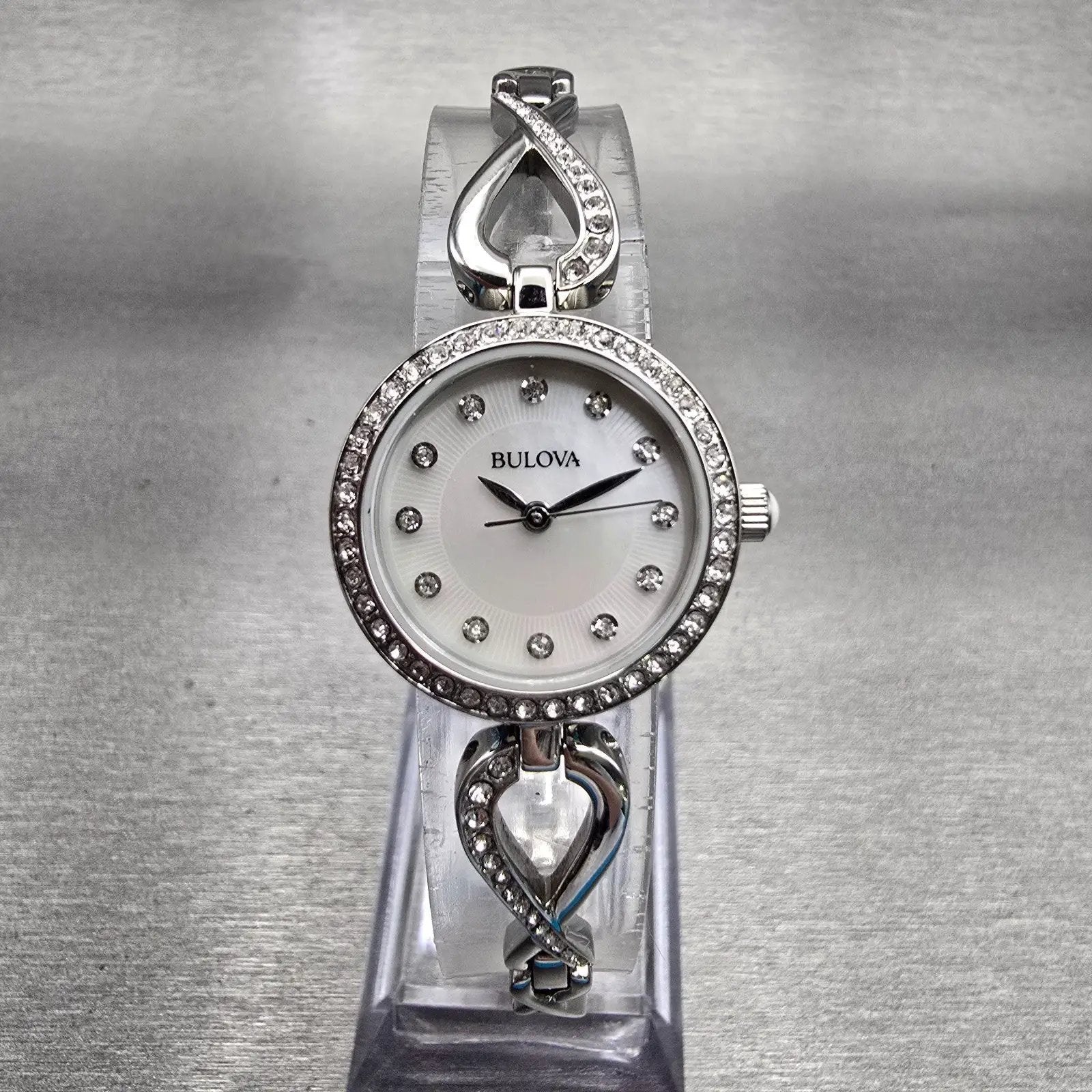 Bulova Watch Women 23mm MOP Dial Silver Tone Gemmed 96X129 New Battery0