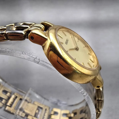 Seiko Watch Women 21mm Champagne Dial Gold Tone Round 1N00-1E09 New Battery VTG3