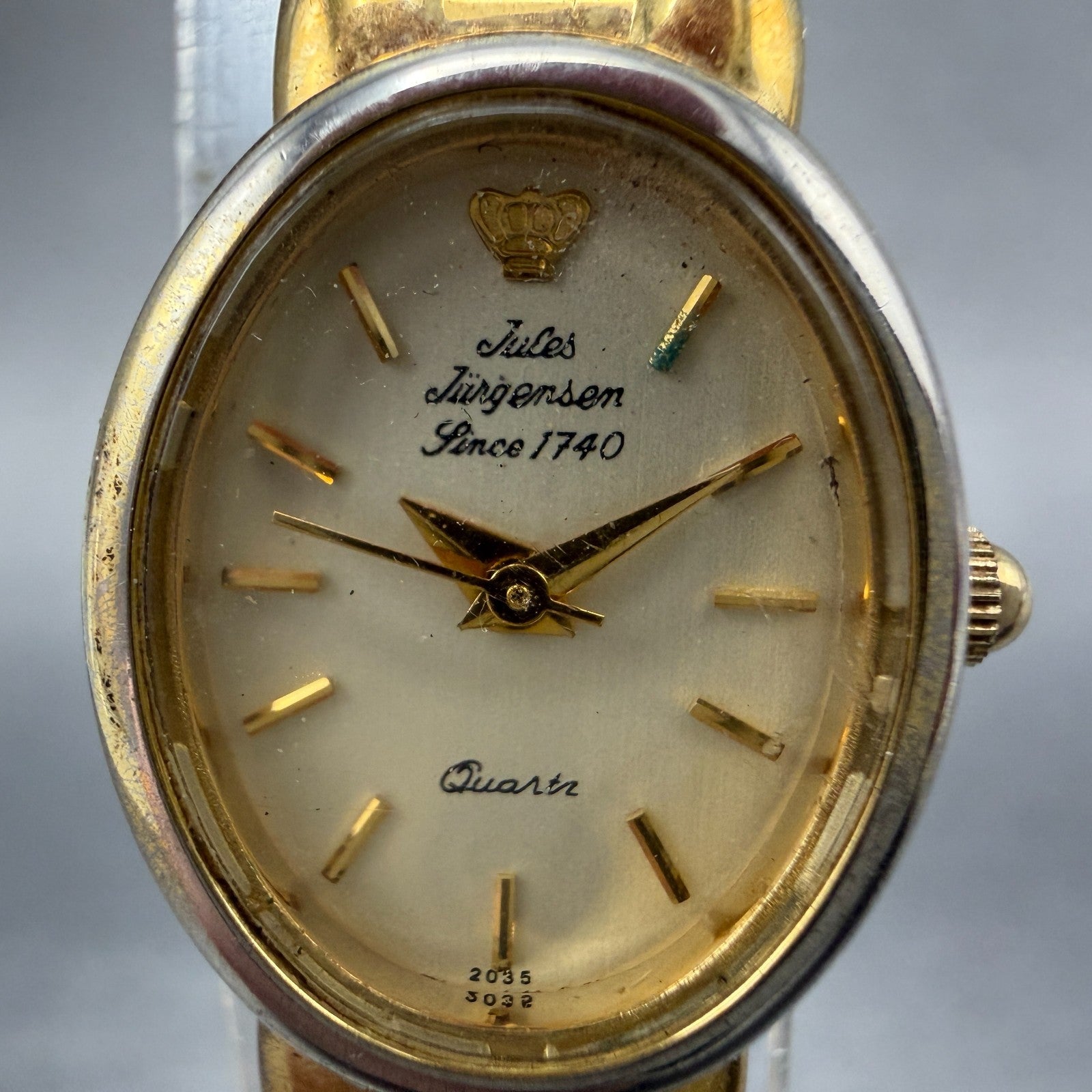 Jules Jurgenson Watch Women 17mm Champagne Dial Gold Oval Blue Gems New Batt 9081