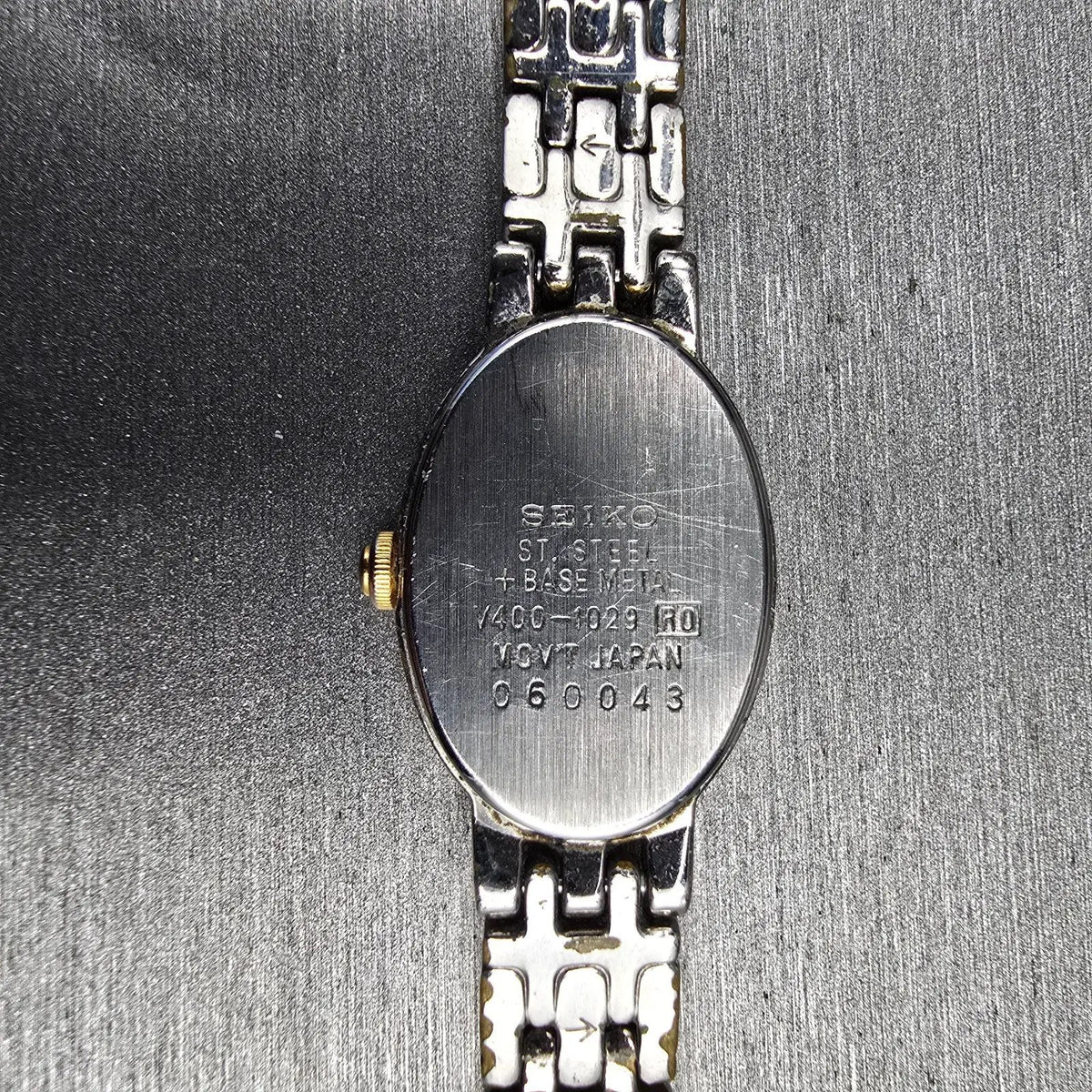 Seiko Watch Women 17mm White Dial Silver Tone Oval V400-1029 New Battery VTG 5610