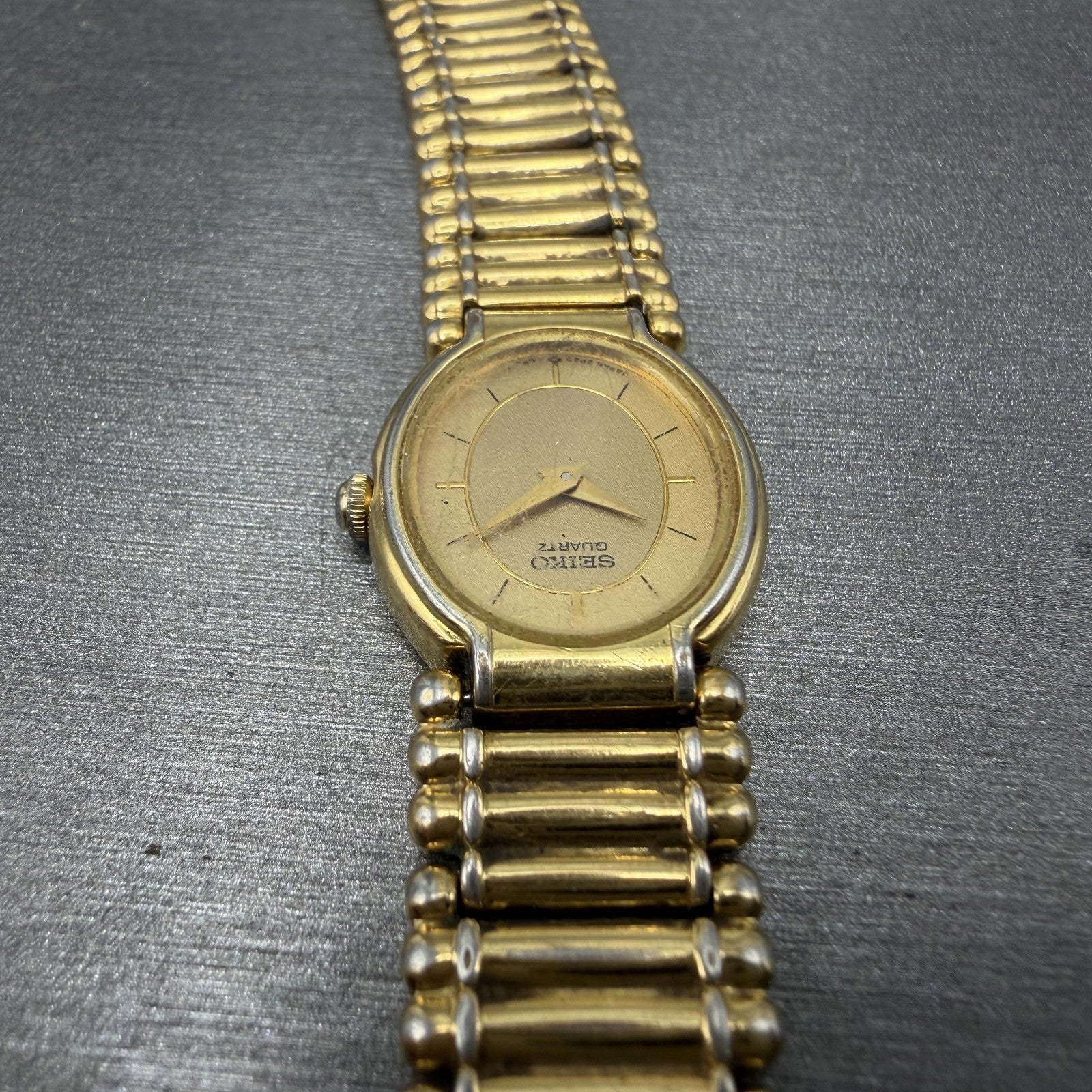 Seiko Watch Women 18mm Gold Dial Gold Tone Oval BROKEN BAND 2P205E29 New Batt4