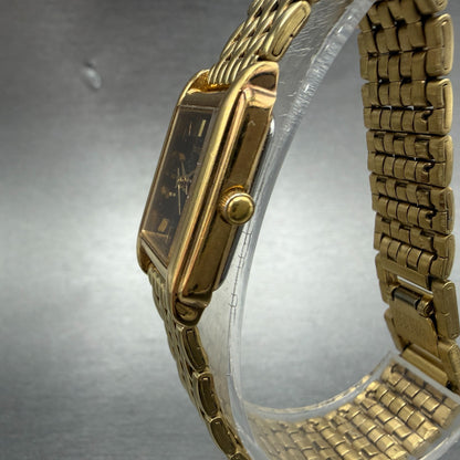 Seiko Tank Watch Women 18mm Black Dial Gold Tone Rectangle V401-5650 New Batt JO2