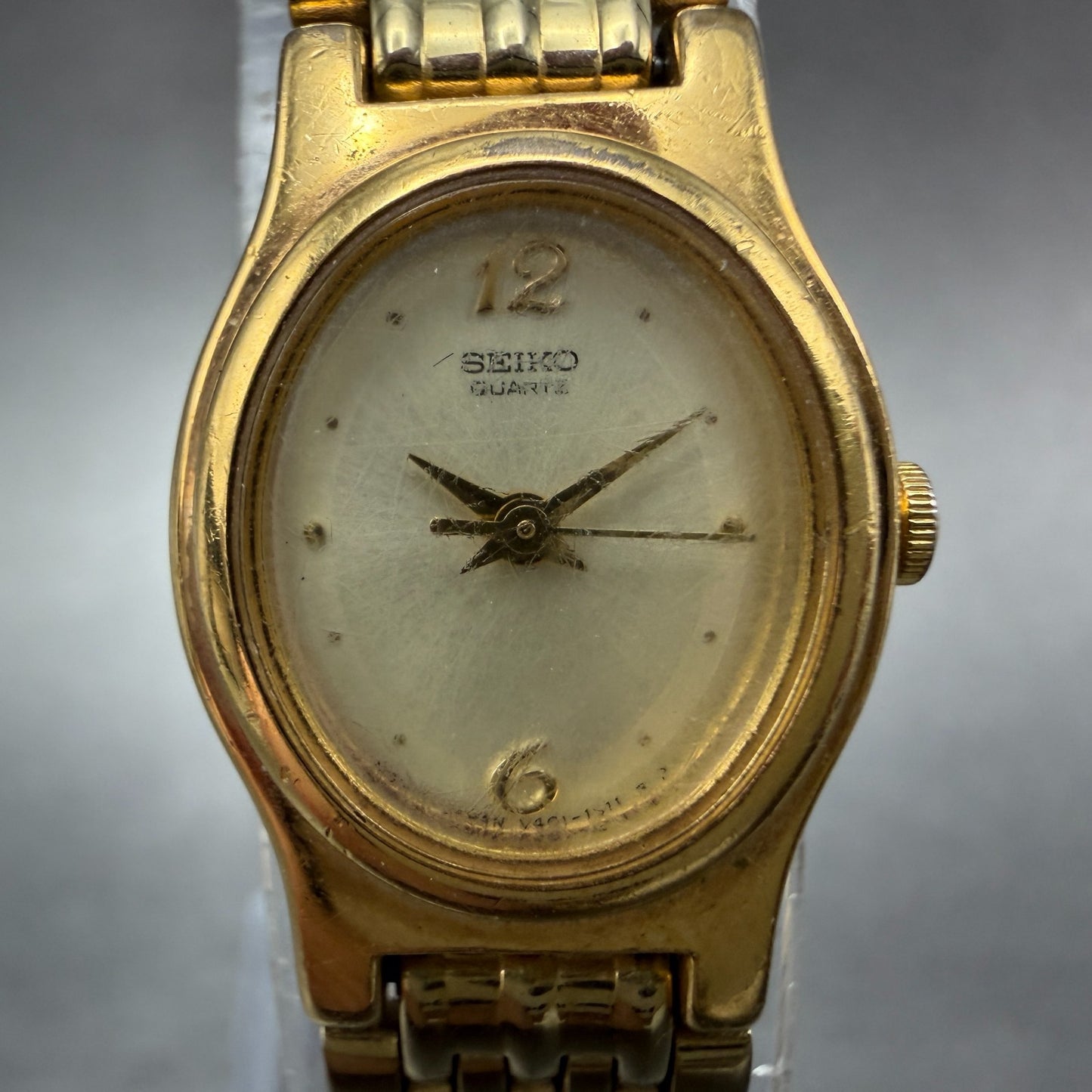 Seiko Watch Women 17mm Champagne Dial Gold Tone Oval V401-5109 New Battery VTG1