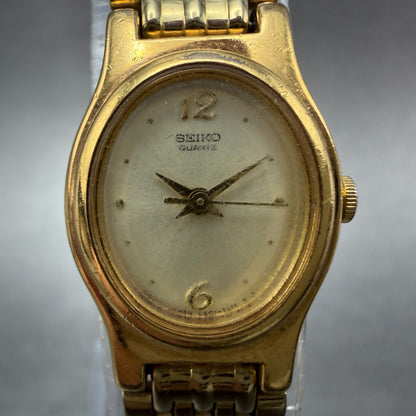 Seiko Watch Women 17mm Champagne Dial Gold Tone Oval V401-5109 New Battery VTG1