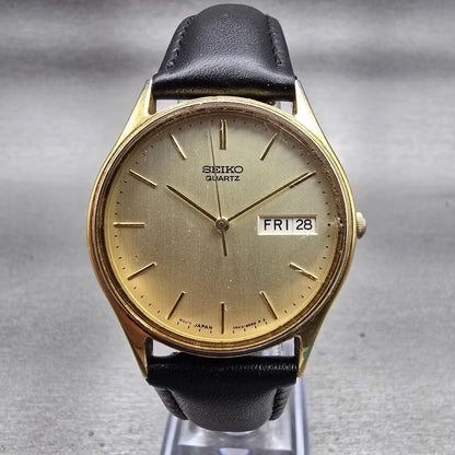 Seiko Watch Men 33mm Champagne Dial Gold Tone Daydate Round 7N43-8A89 New Batt0