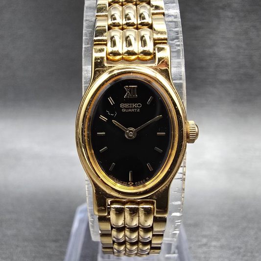 Seiko Watch Women 14mm Black Dial Gold Tone Oval 1F20-5B99 New Battery Vintage P0