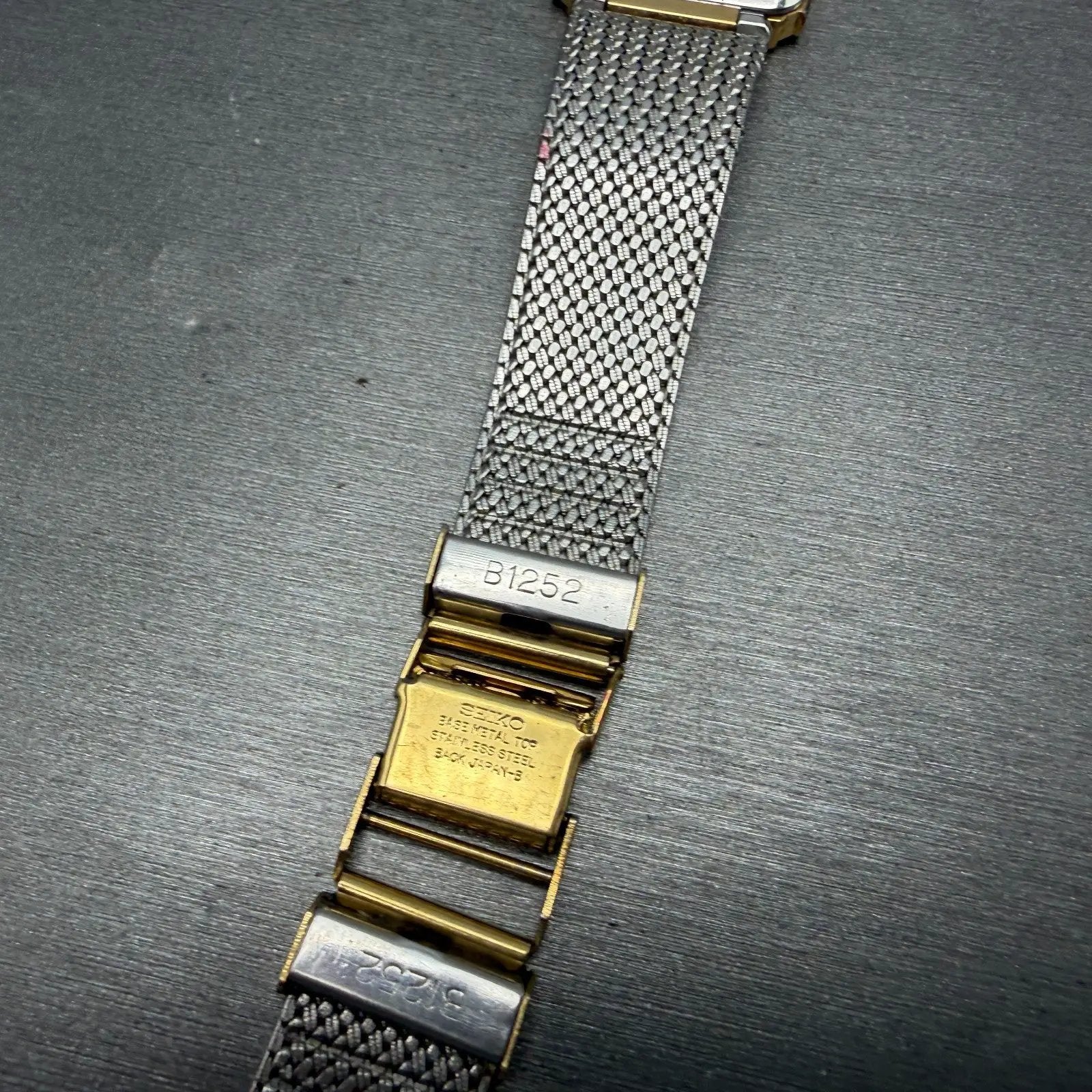 Seiko Tank Watch Men 25mm Black Dial Gold Tone Rectangle READ!! 7430-5499 NewBat14