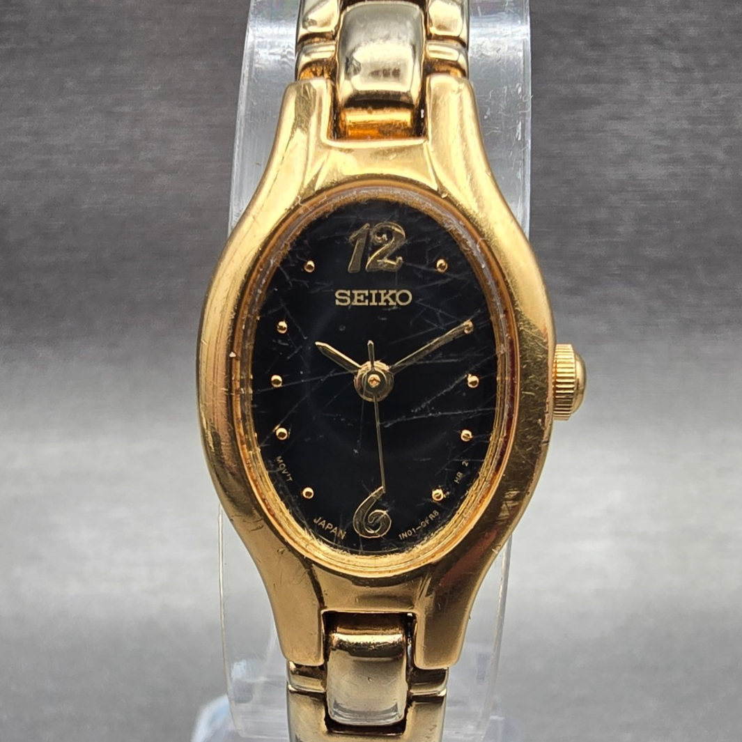 Seiko Watch Women 16mm Black Dial Gold Tone Oval 1N01-0CS0 New Battery Vintage D0