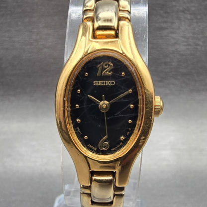Seiko Watch Women 16mm Black Dial Gold Tone Oval 1N01-0CS0 New Battery Vintage D0