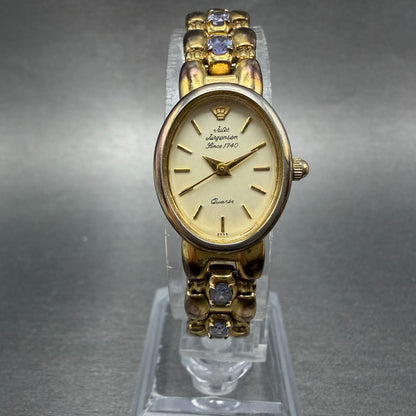 Jules Jurgenson Watch Women 17mm Champagne Dial Gold Oval Blue Gems New Battery0