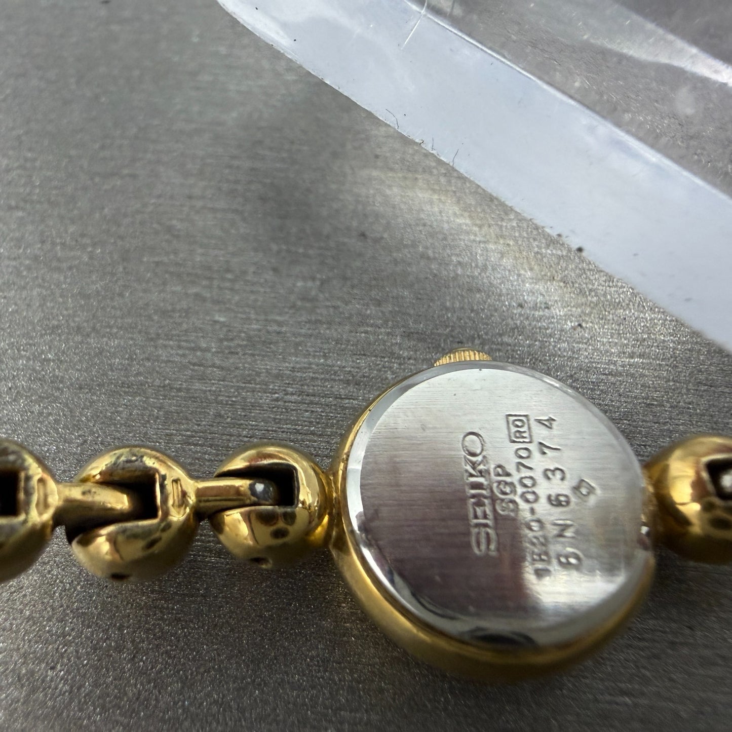 Seiko Watch Women 14mm Champagne Dial Gold Tone Round 1E20-0070 New Battery9