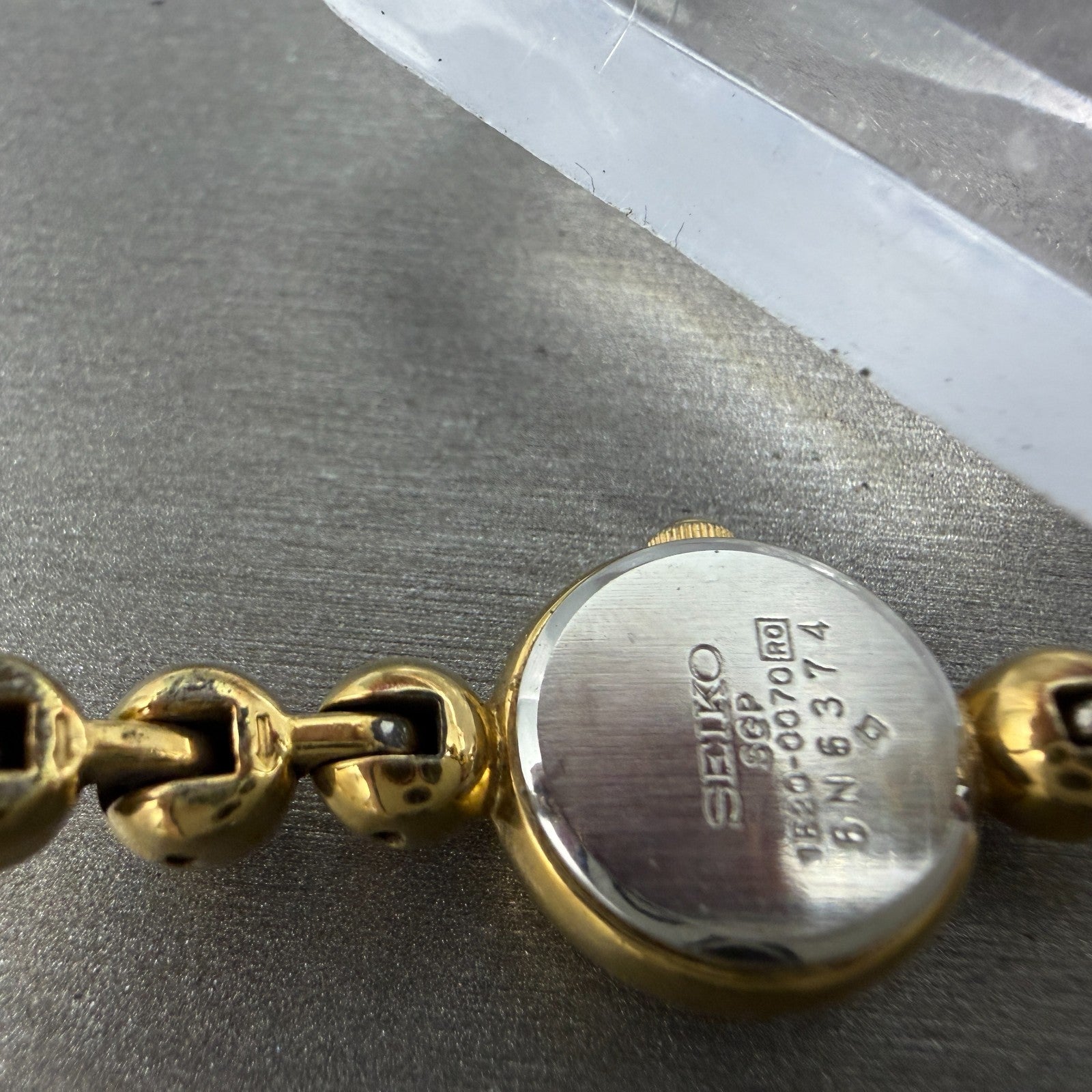 Seiko Watch Women 14mm Champagne Dial Gold Tone Round 1E20-0070 New Battery9