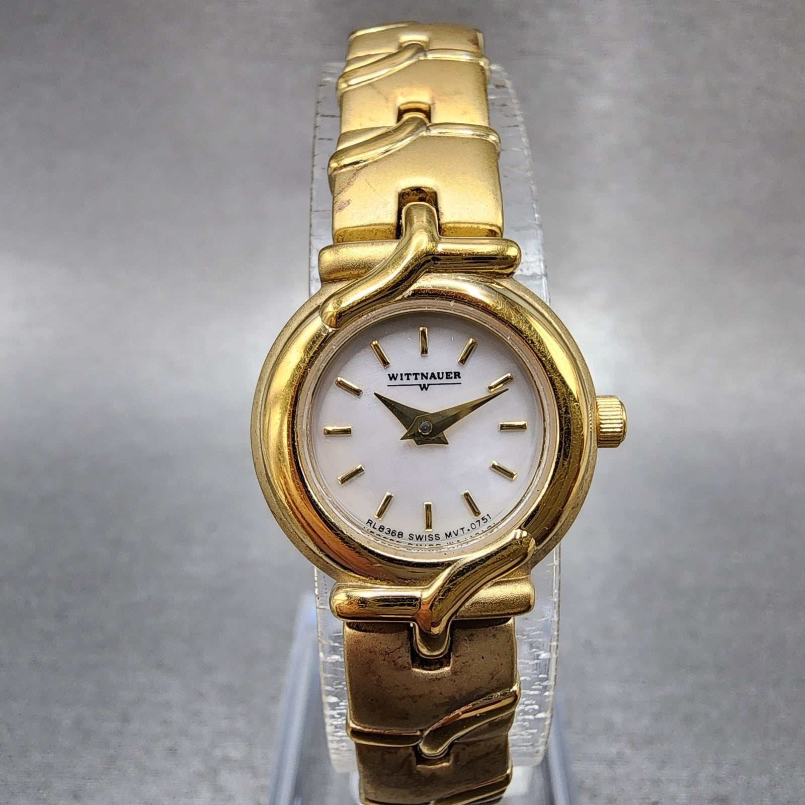 Wittnauer Watch Women 19mm MOP Dial Gold Tone Round RL8368 New Batttery0
