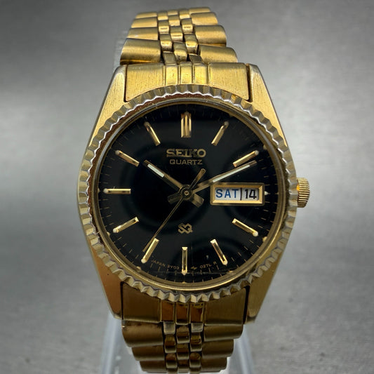 Seiko SQ Watch Women 24mm Black Dial Gold Tone Daydate 24mm Round New Battery I90