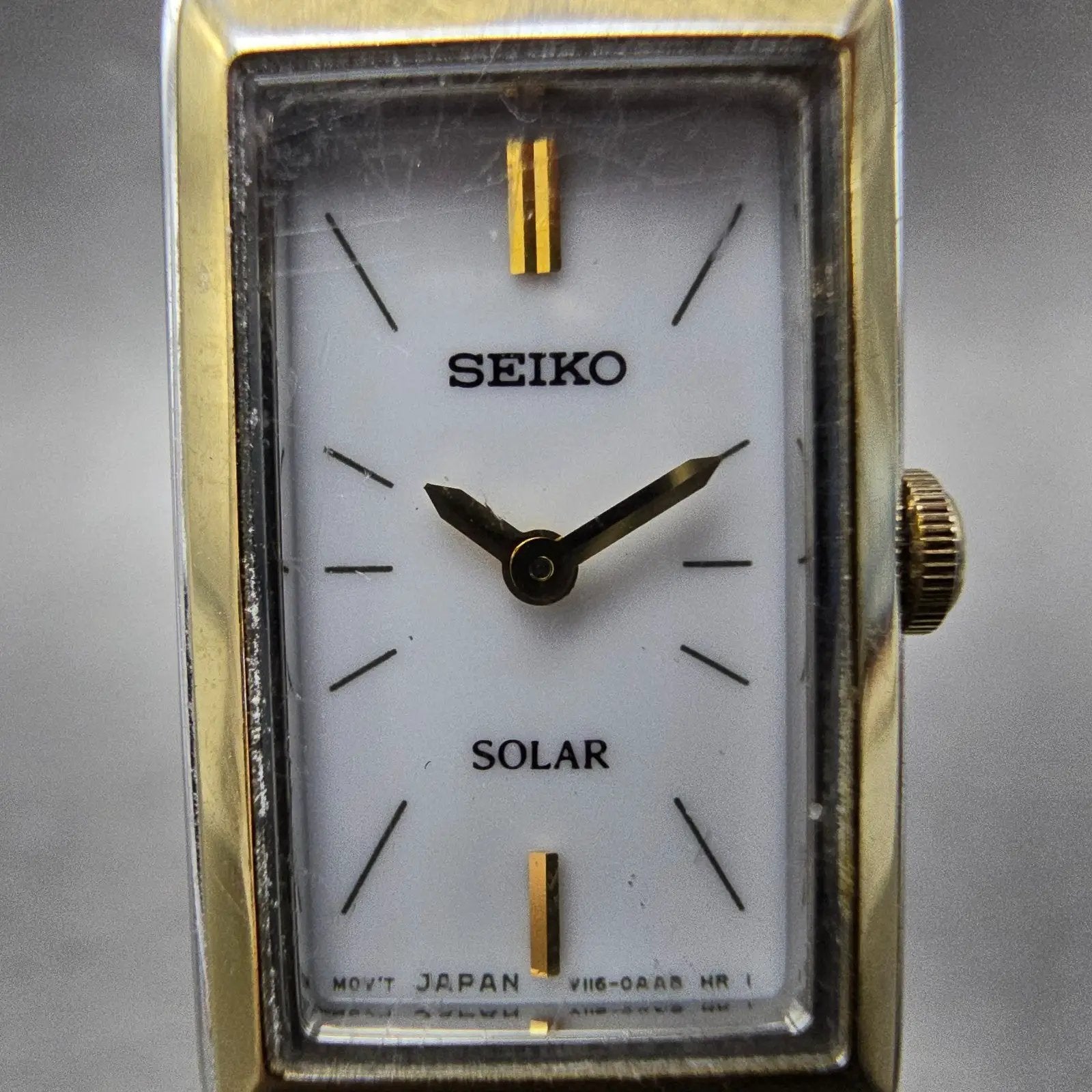 Seiko Solar Tank Watch Women 15mm White Dial Two Tone Rectangle V116-0AA0 WorksL1