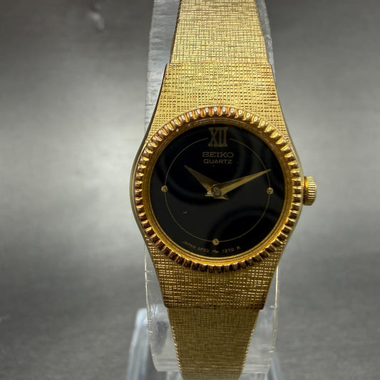 Seiko Watch Women 18mm Black Dial Gold Tone Round Vintage 2P20-0339 New Battery0