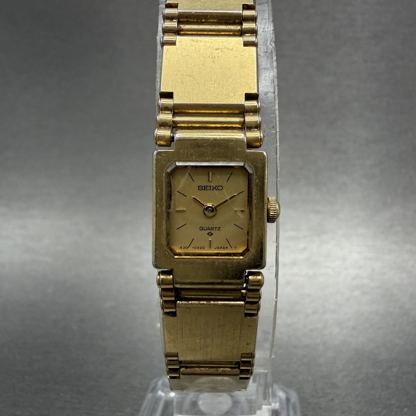 Seiko Watch Women 13mm Champagne Dial Gold Tone Square 1E205209 New Battery0