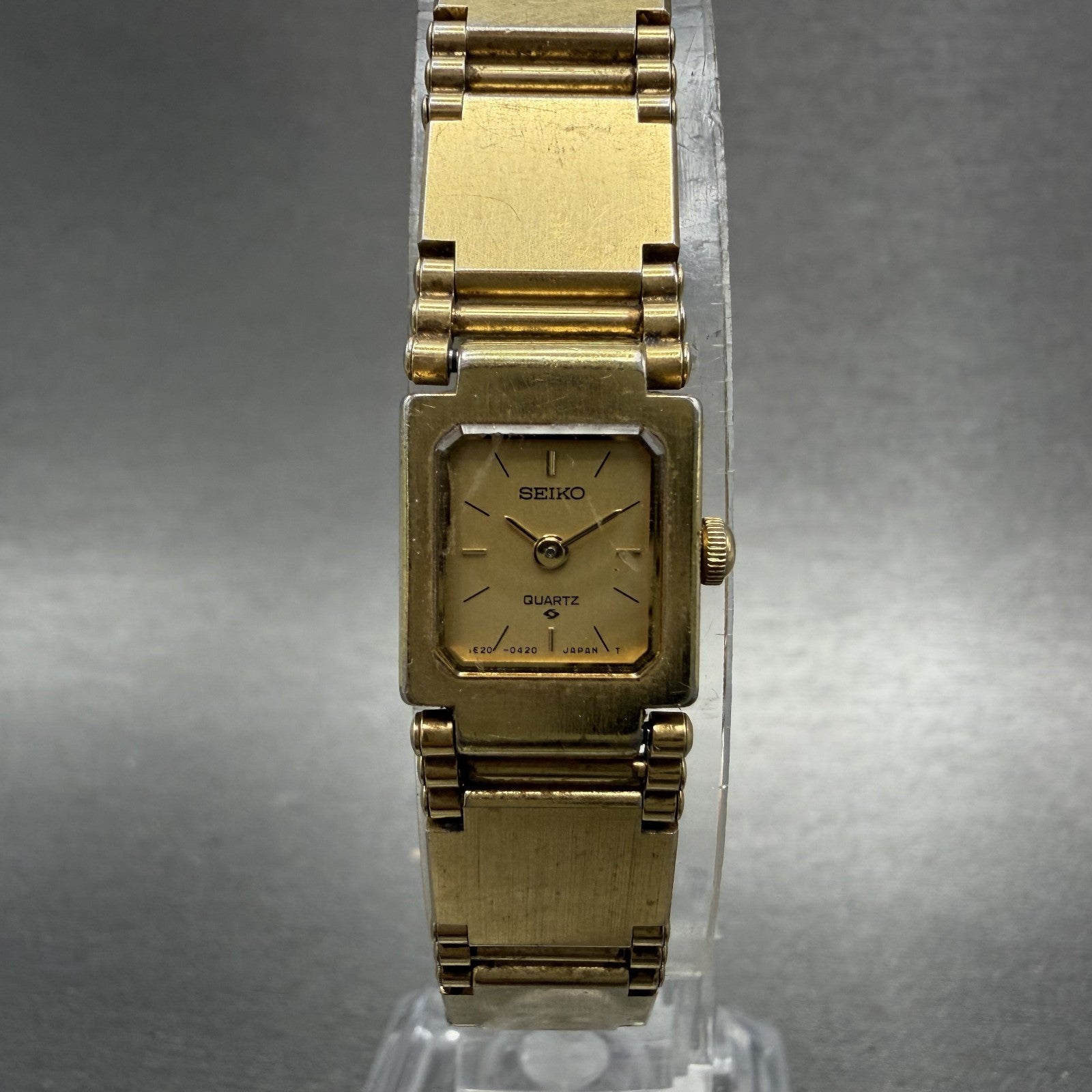 Seiko Watch Women 13mm Champagne Dial Gold Tone Square 1E205209 New Battery0